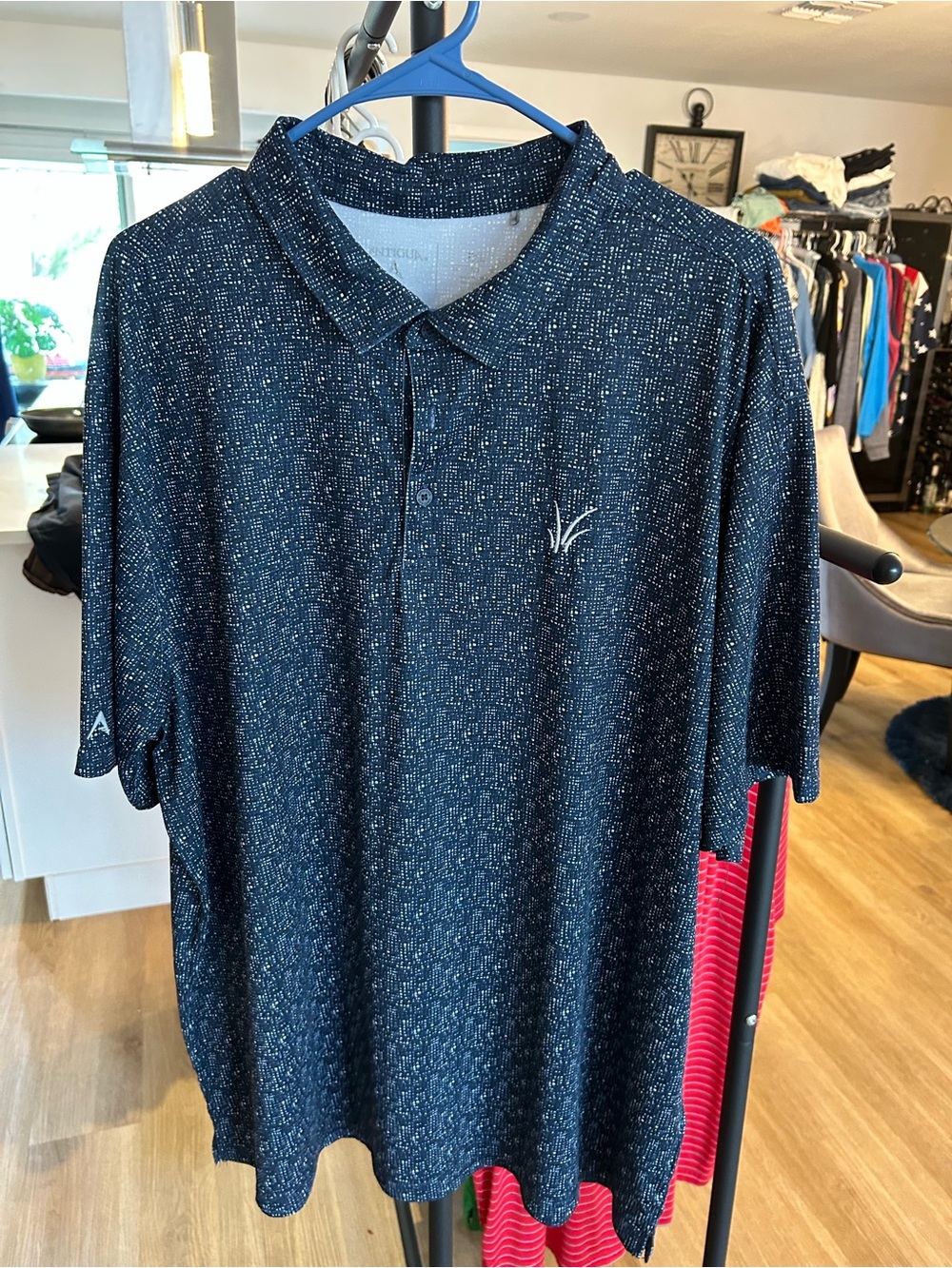 Men's Black Heathered Polo Shirt with Subtle White Pattern